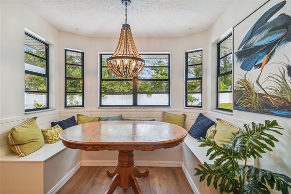 The kitchen includes a built-in dinette directly adjacent to the dining room- perfect kid's table!