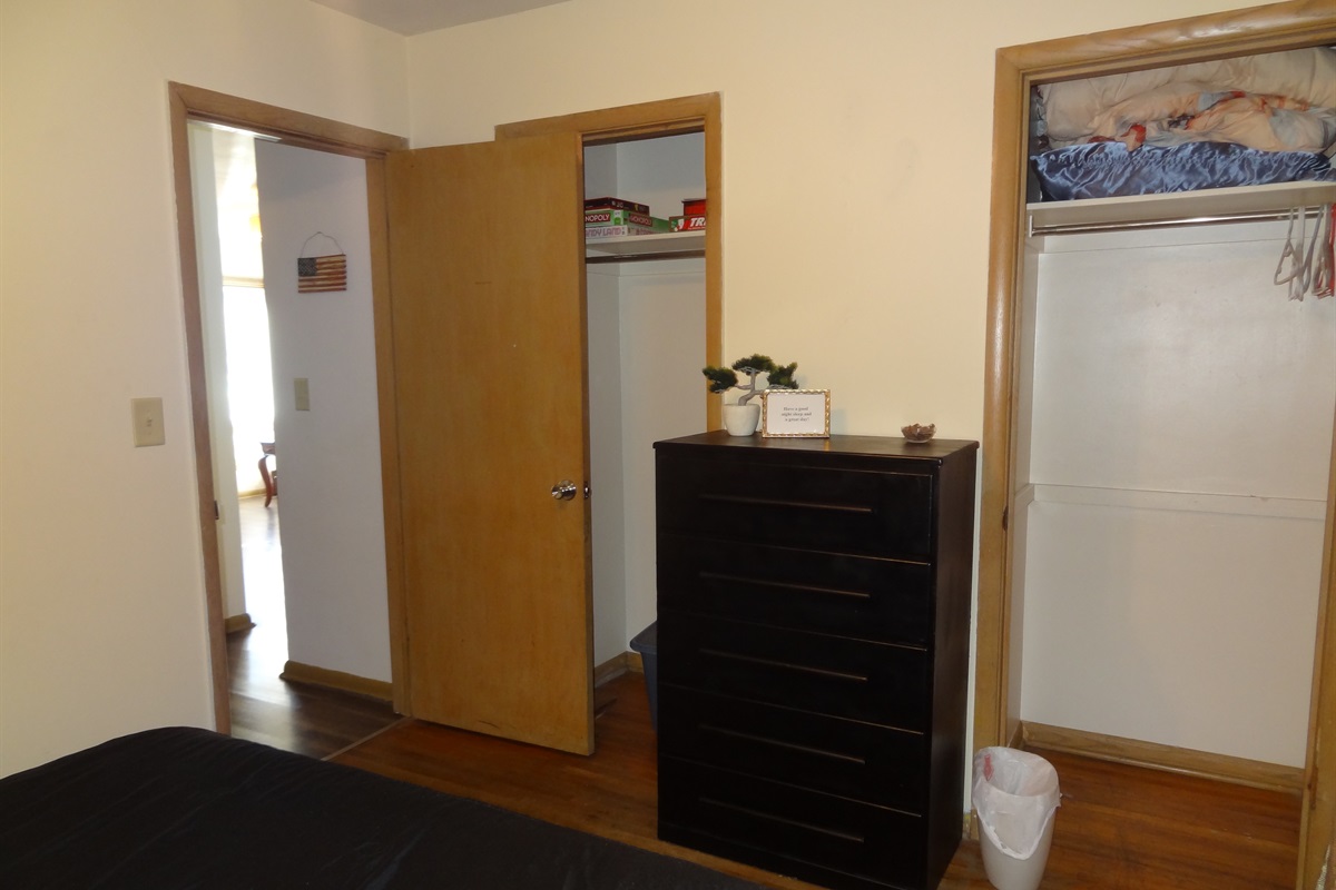 2nd Bedroom with queen bed, dresser, ceiling fan