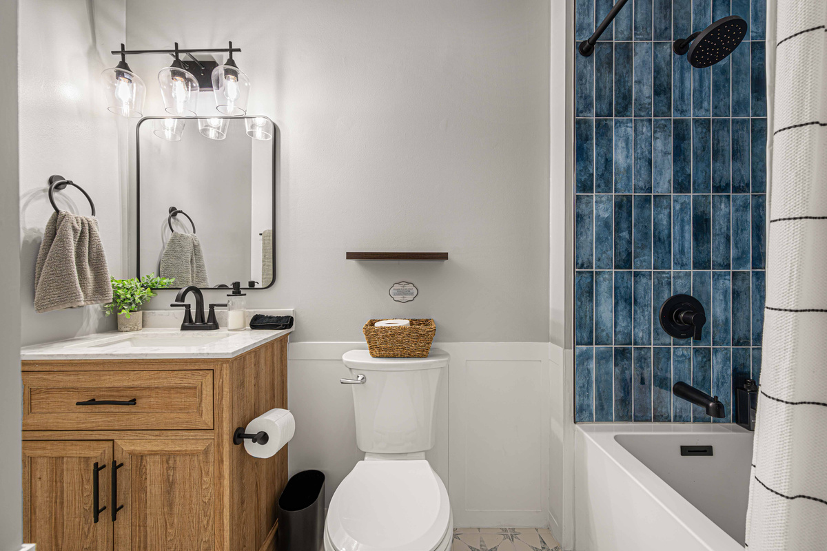 Bathroom Oasis: Stylish retreat with modern fixtures and chic tile accents for ultimate relaxation!