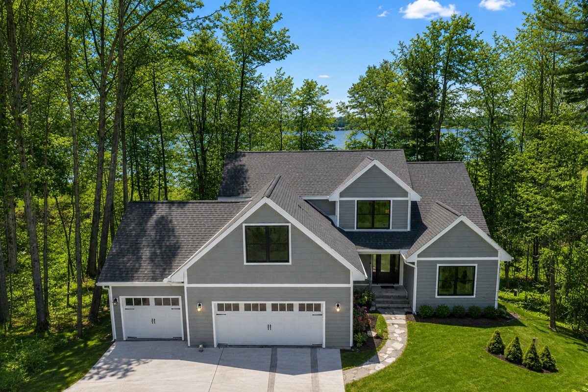 Welcome to Sweetwater Solara, a spacious 6 bedroom home on Bass Lake, 5 minutes from downtown Elk Rapids and just 17 minutes to the horse shows at Flintfields Horse Park.  