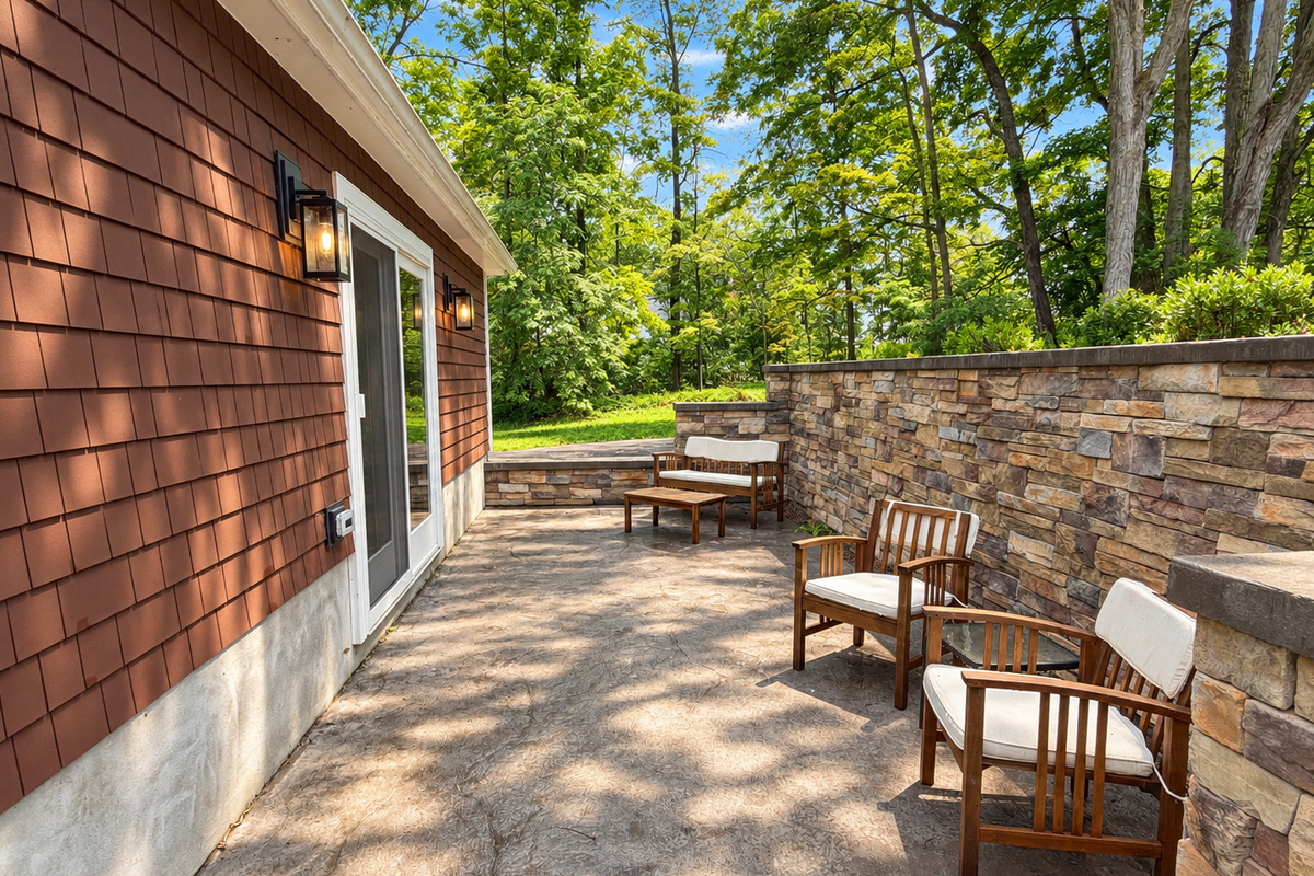 Back patio with seating area, accessible via the mudroom.