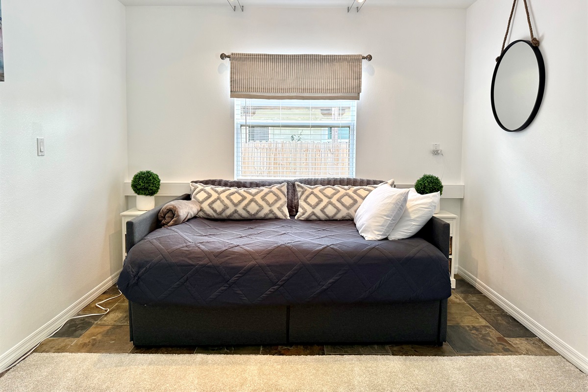 A fun, flexible room with a full bed and entertainment options.