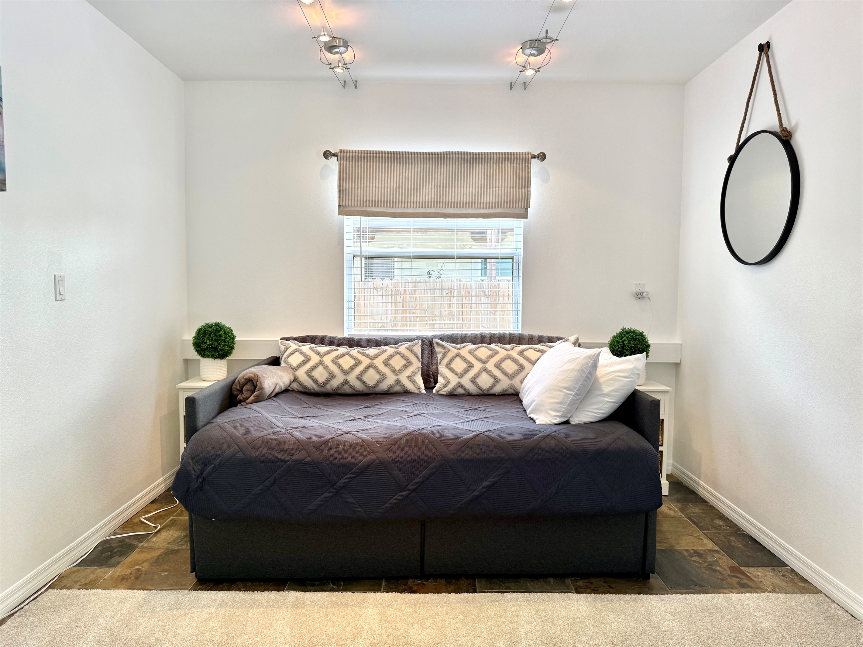 A fun, flexible room with a full bed and entertainment options.