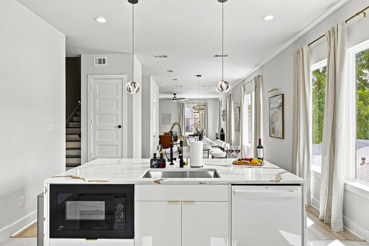 Bright space with sleek finishes, perfect for culinary adventures and gatherings!