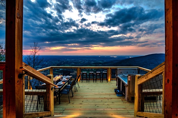 Escape to the "Chasing Sunset" Cabin where our guests enjoy sweeping and breathtaking panoramic long range mountain views, glowing sunsets, and intimate sparkling city lights at night.