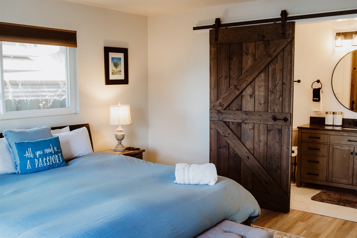 A refined ensuite bedroom designed for comfort and privacy.