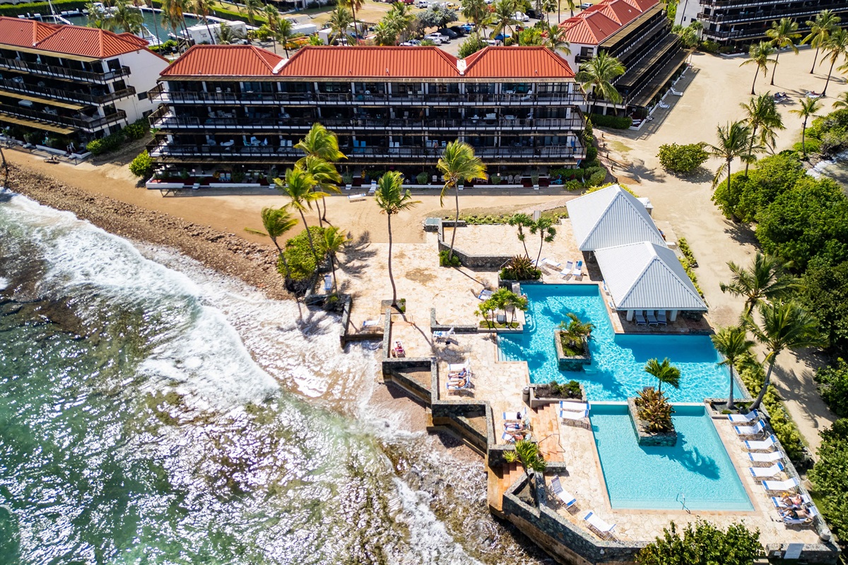 Resort-style living with pool, beach, and breathtaking views