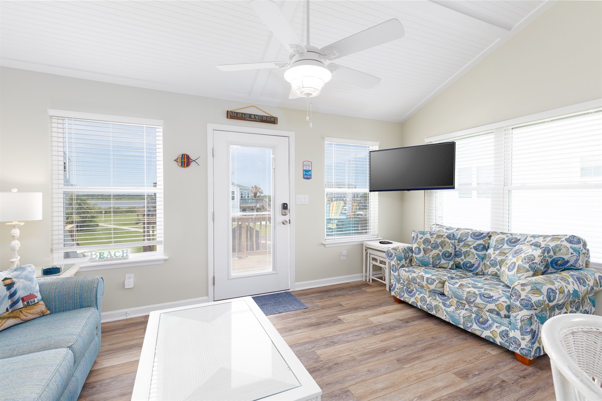 Comfortable seating and flat-screen TV in living area