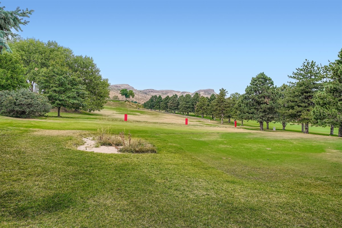 Small driving range behind house