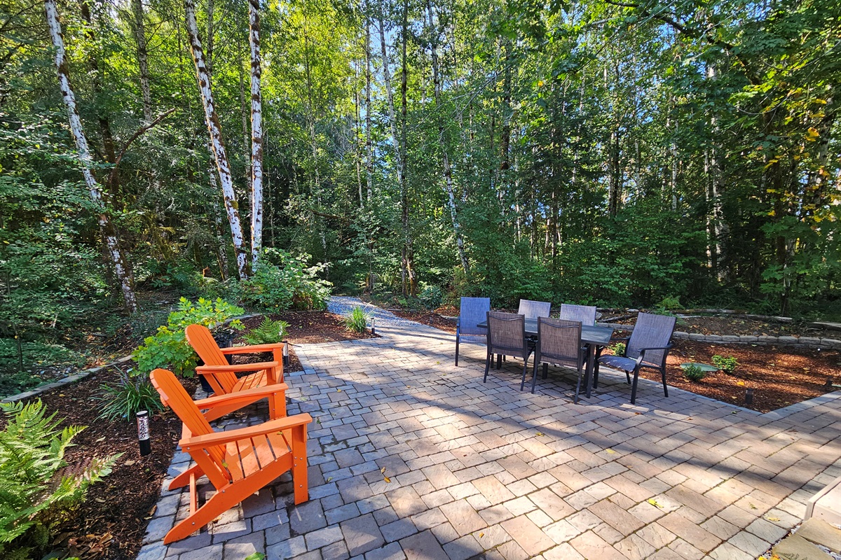 A wetland forest trail departs the patio and intersects the property-wide trail system, leading to picnic areas and the shores of Mill Creek, where you may launch kayaks into Lake Isabella.