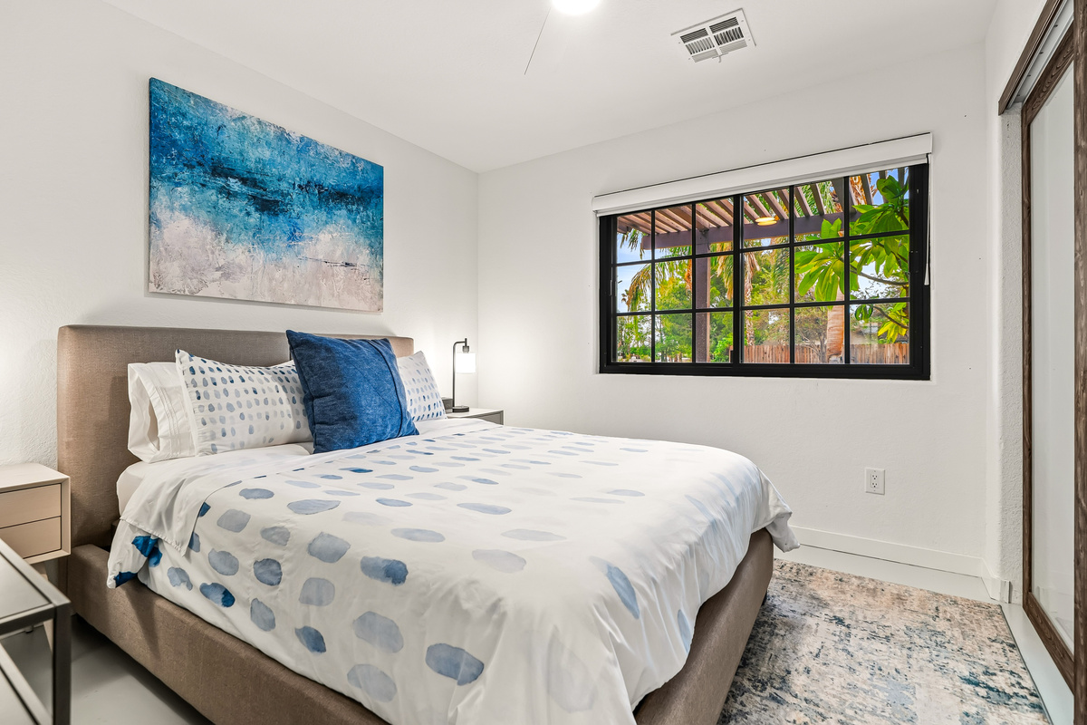 guest bedroom with backyard view