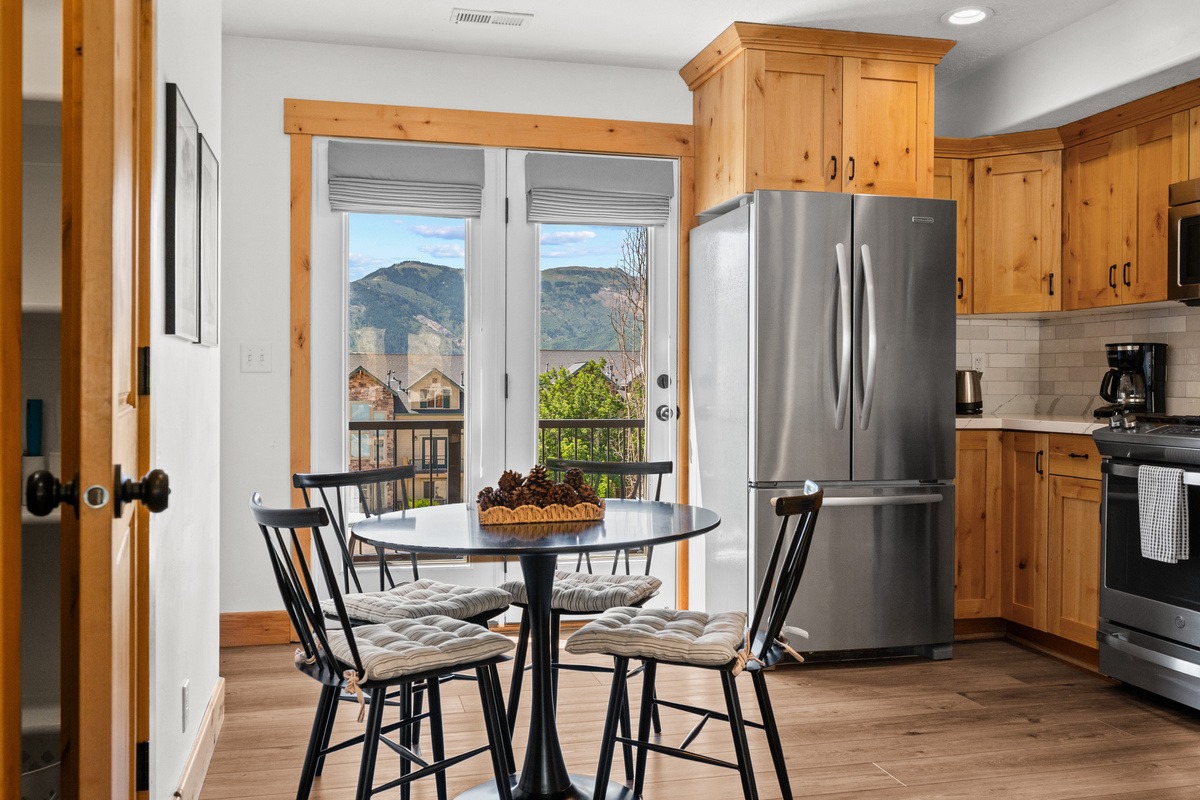 Enjoy meals together beside large patio doors that bring in plenty of natural light.