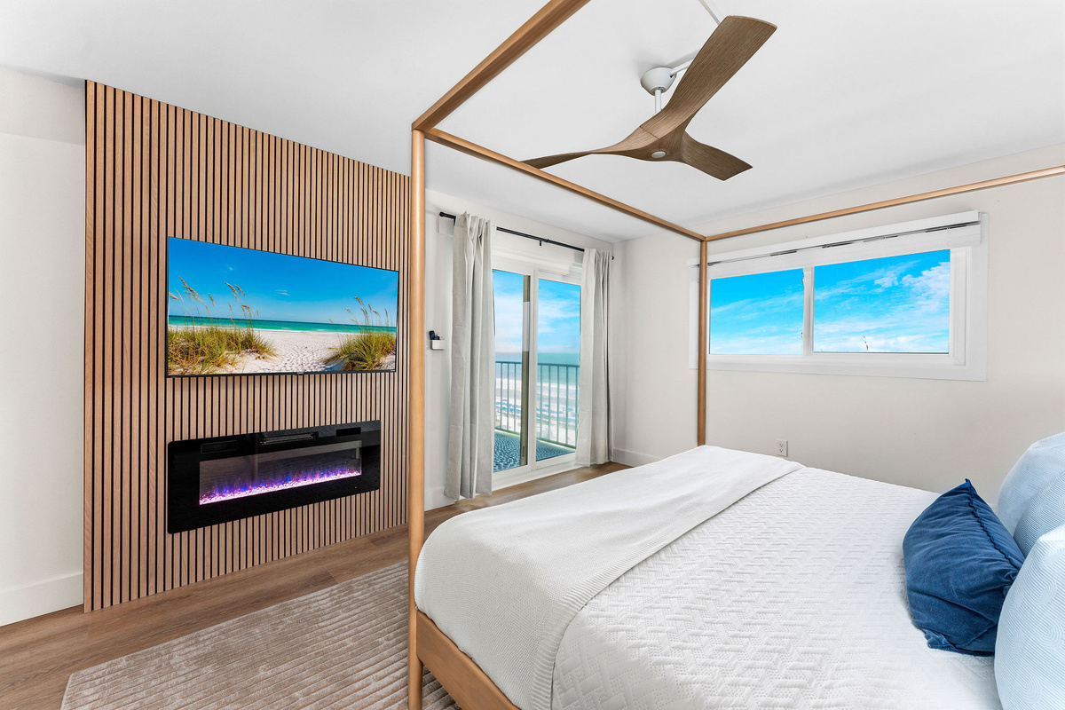 Unwind after a long beach day by turning on the electric fireplace in the master bedroom en suite while enjoying the oceanfront view.