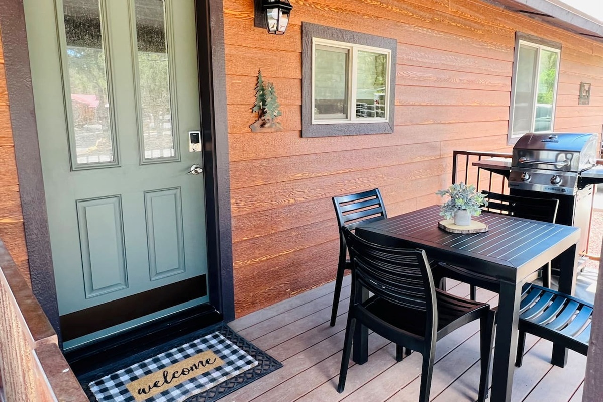 On this porch, there is a lot of sipping, grilling, and chilling
