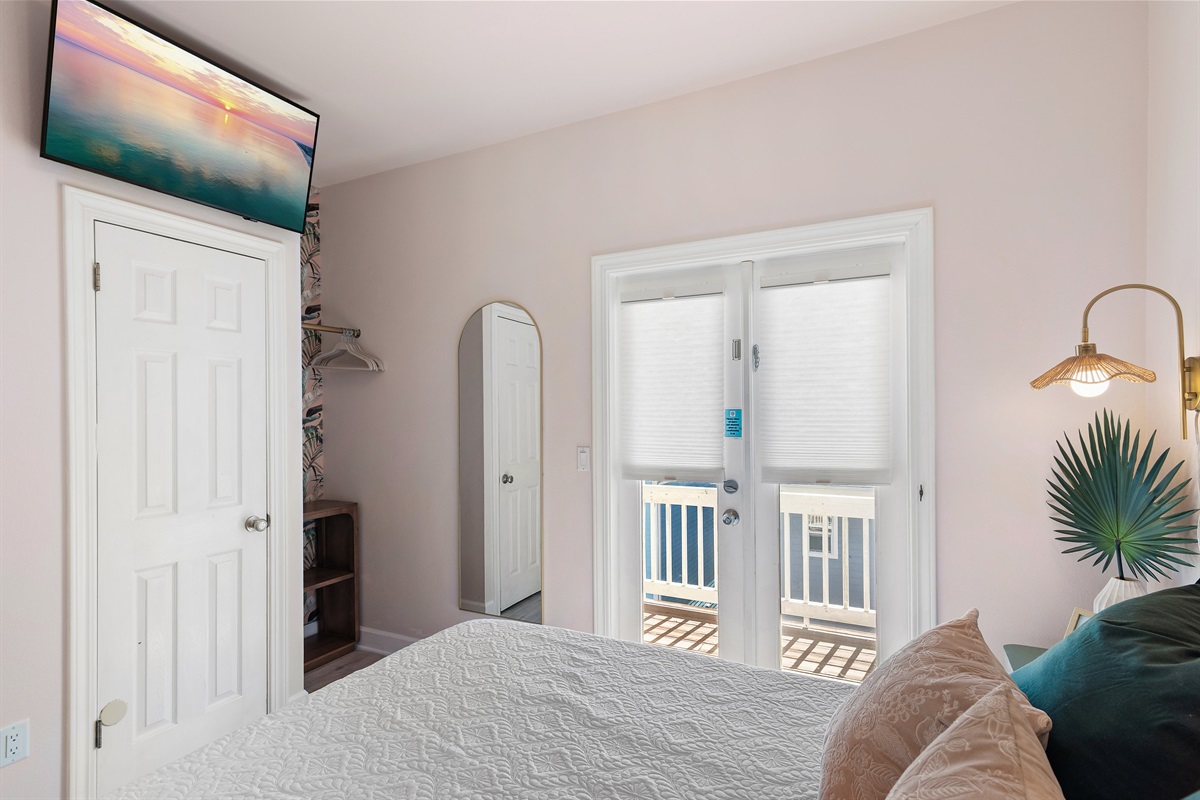 Guest Room 3 (Level 2): Queen bed, Smart TV, Balcony Access, Hallway Bathroom with Shower Tub Combo on Level 2 or Bathroom with Walk in Shower on Level 1 (Sleeps 2)