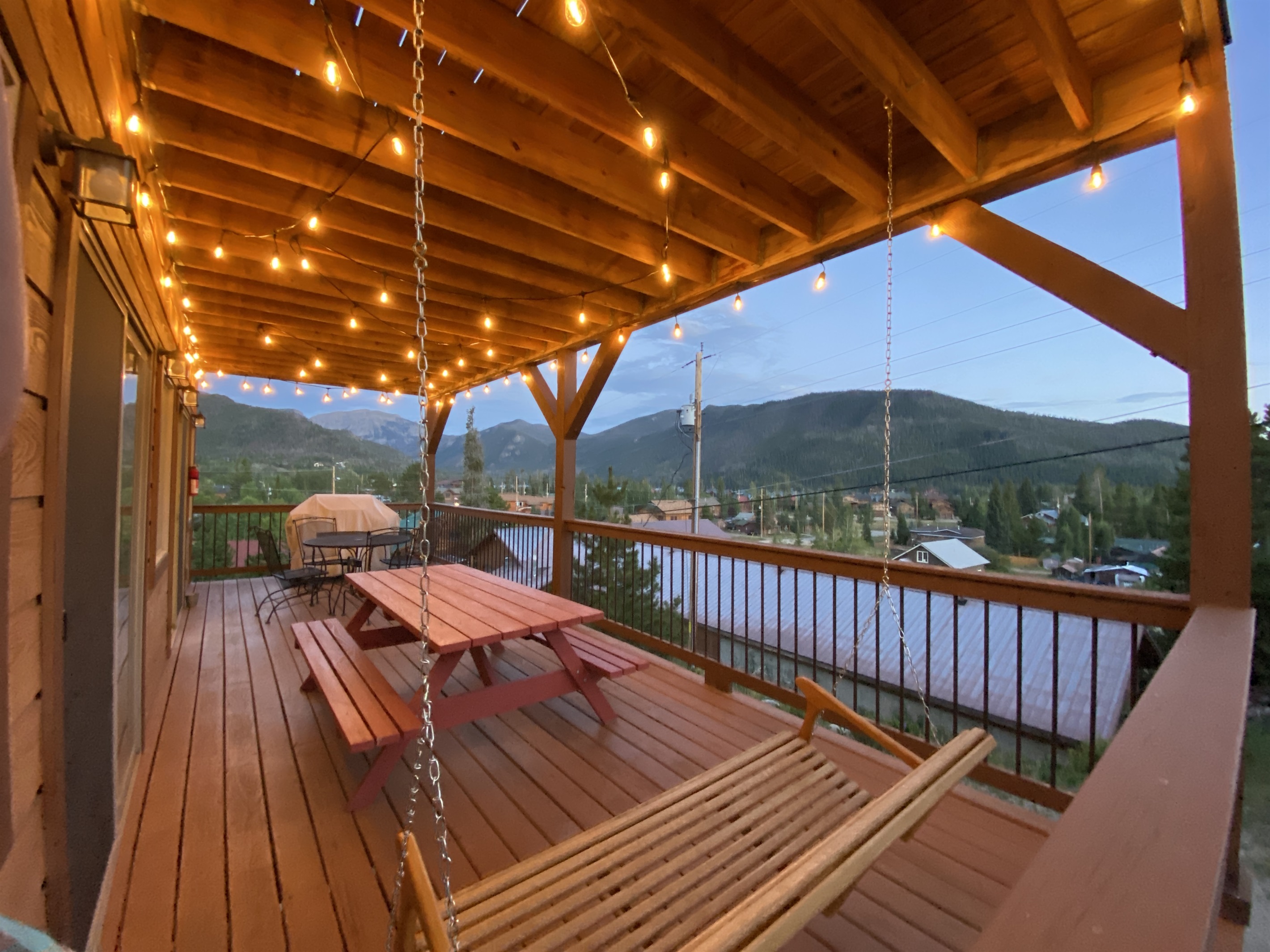 Imagine BBQs under twinkling string lights, dining at a rustic picnic table with views overlooking town. Memories to be made!