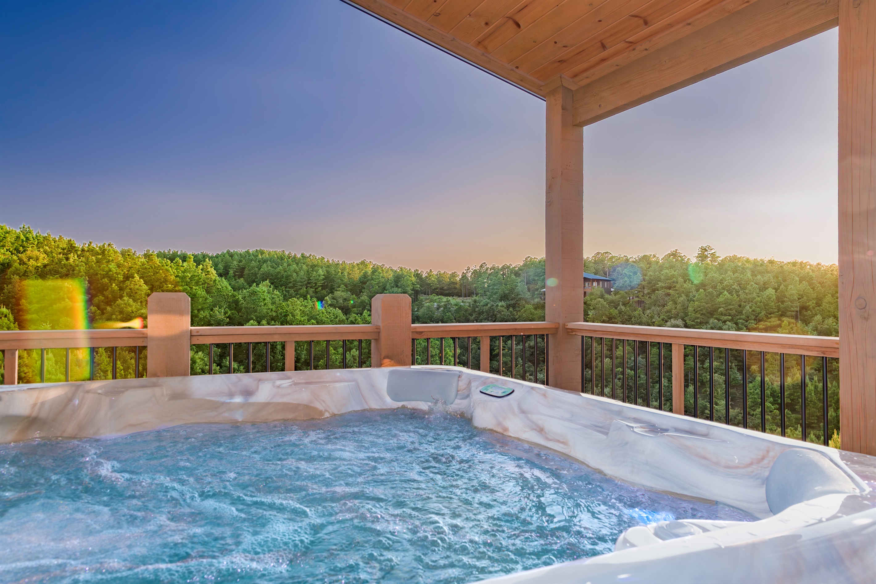 Experience tranquil hot tub high above forest