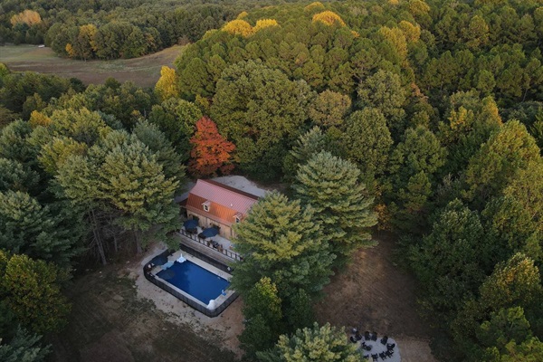 True seclusion from above. See how the Lodge is perfectly nestled within its own 16-acre forest, offering you total privacy and direct access to thousands of acres of protected wilderness.