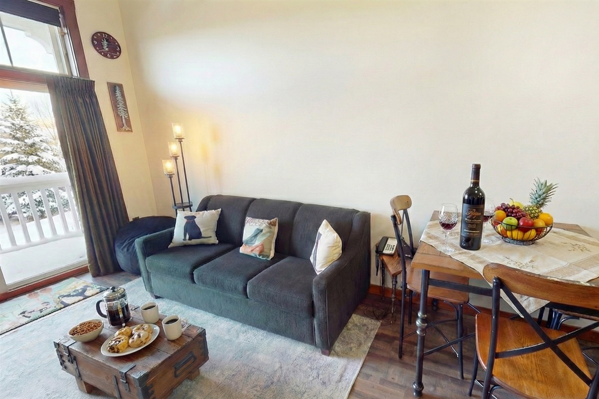 Warm up by the fire with a cup of cocoa and breathtaking mountain views right from your couch.