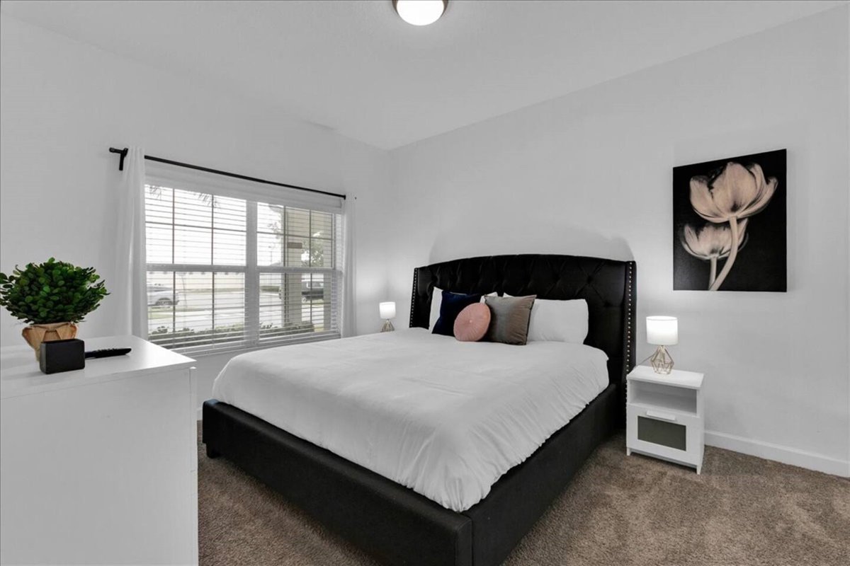 Downstairs, you will find a bedroom with one King bed and TV &ndash; perfect for those who avoid stairs. 
