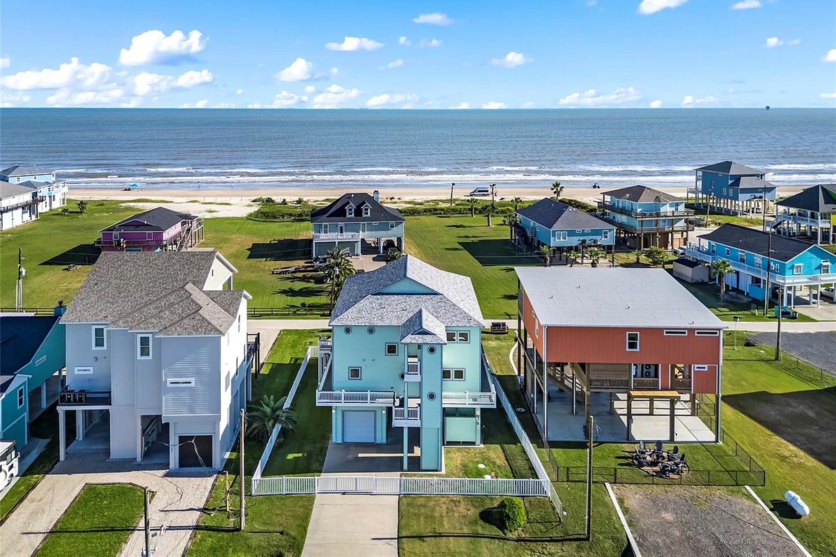 Crystal Paradise Exterior: Welcome to your coastal escape, this is the home and ocean scenery that will set the tone for your entire stay.