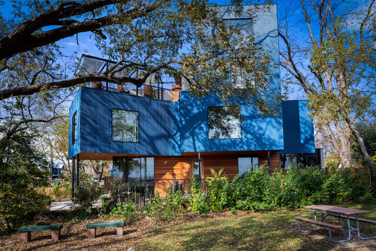 Private outdoor setting surrounded by mature trees—peaceful, shaded, and perfect for enjoying the fresh Austin air.