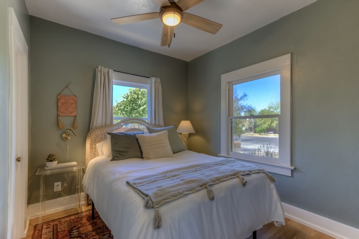 front bedroom with reading lights and closet