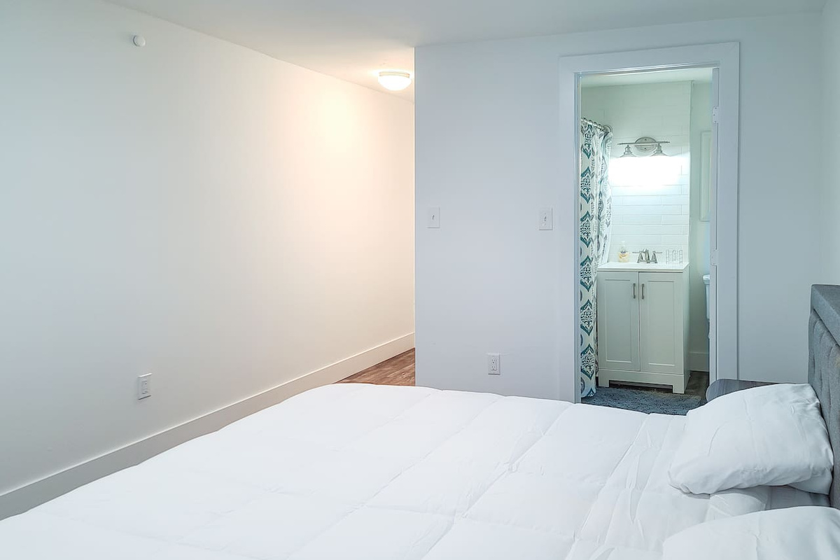 Bedroom 4: Private King Suite showing Full Bath with tub / shower