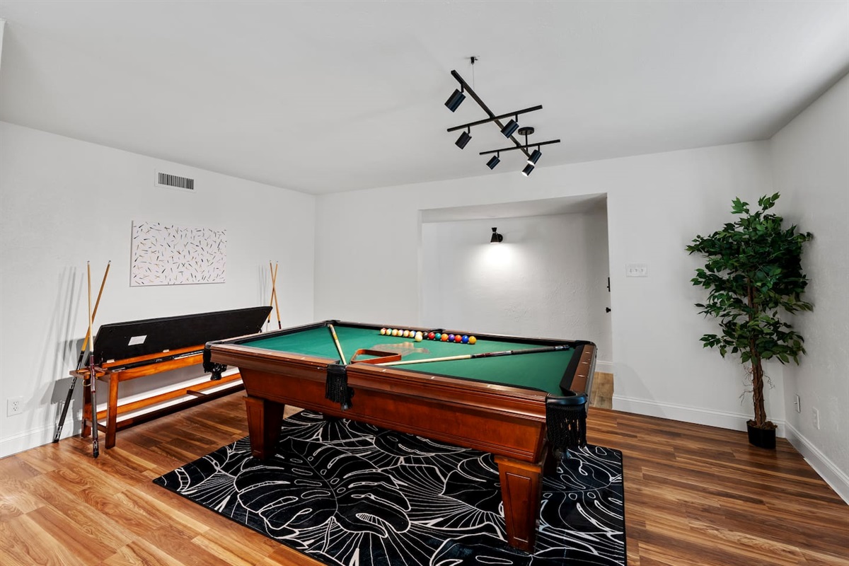 Level up your stay with a dedicated game room featuring a professional-grade pool table.