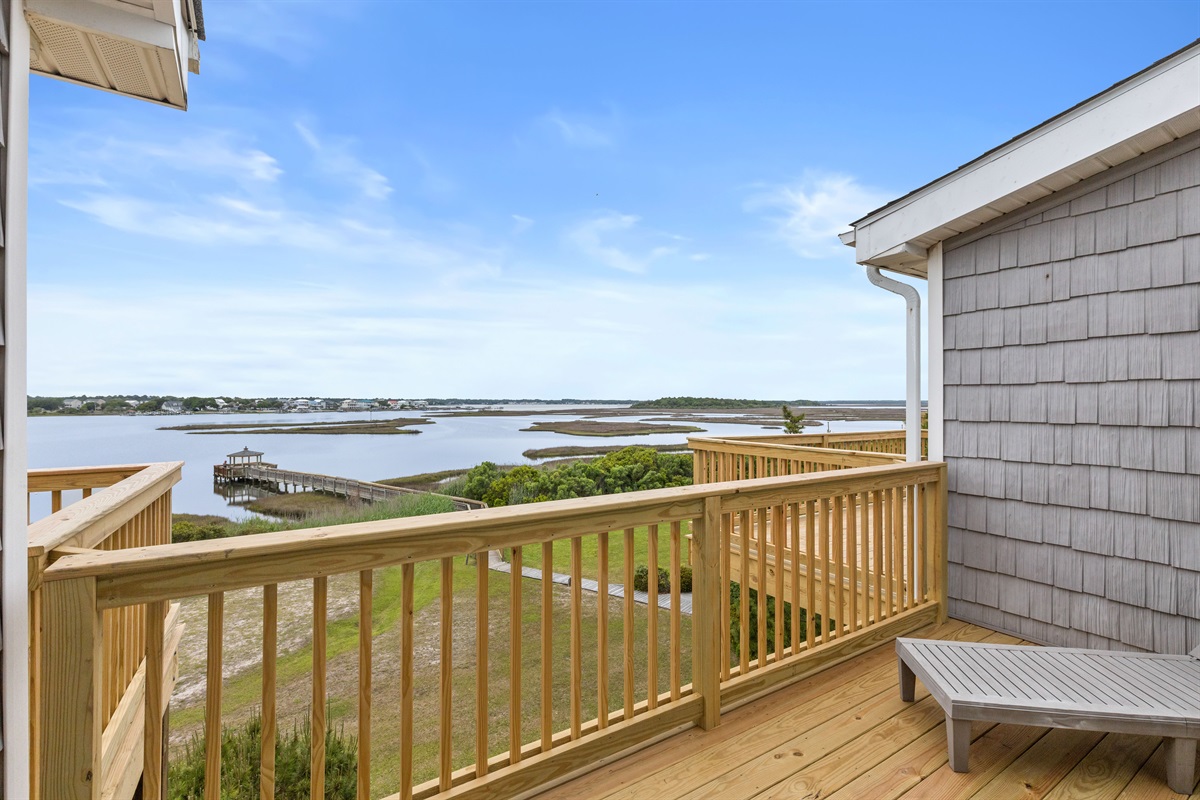 Expansive deck with sweeping marsh and water views