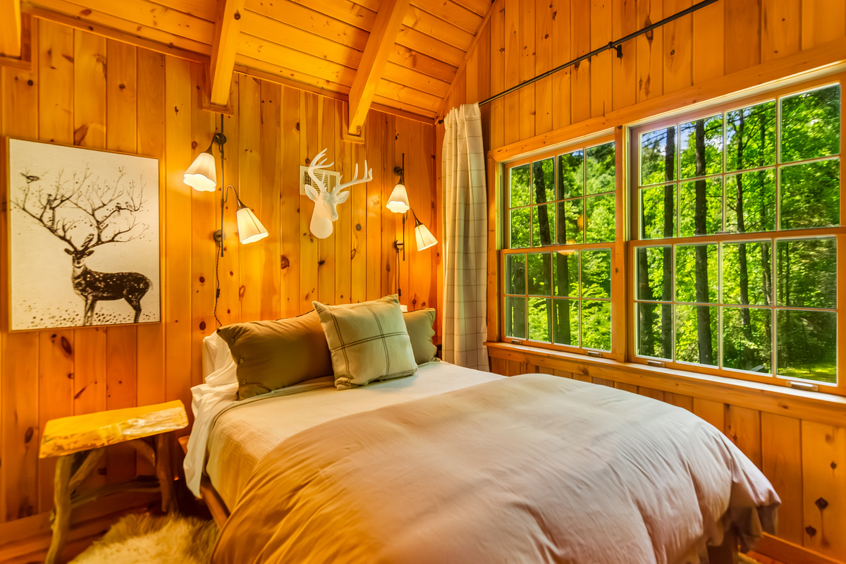 Secondary bedroom overlooking the fire pit area 