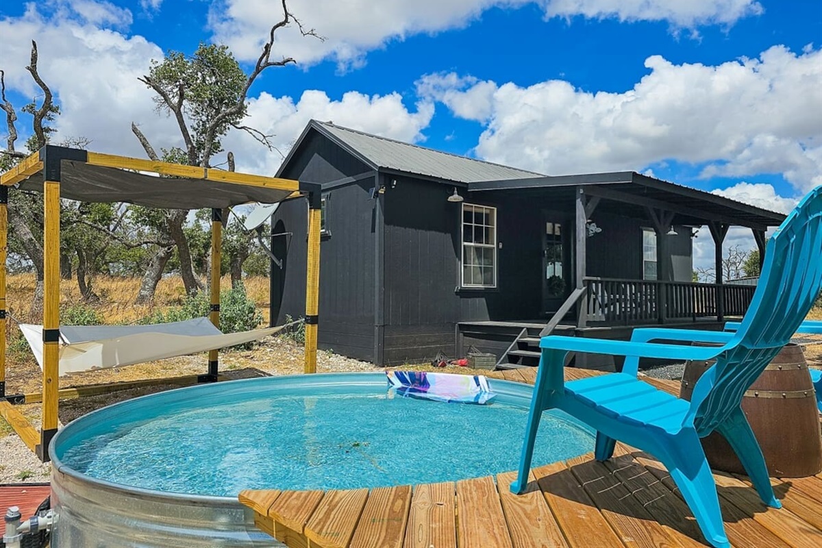 Step right from the deck into the refreshing pool—your private oasis in the Hill Country.