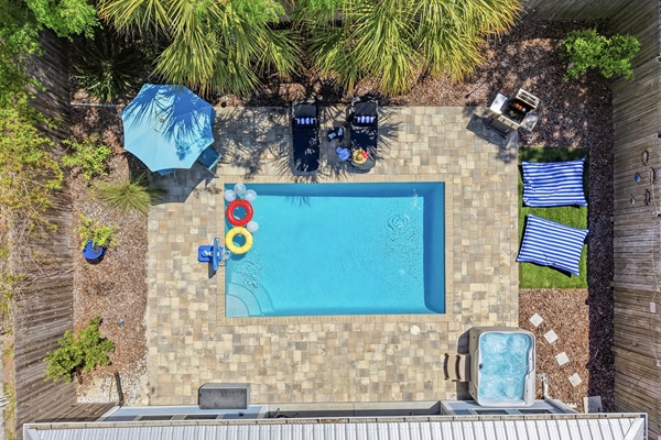 Relax on the pool deck with your favorite beverage, and watch friends and family play the day away in the pool with floats, basketball, masks and more, or simply hang in the hot tub and soak for the evening.