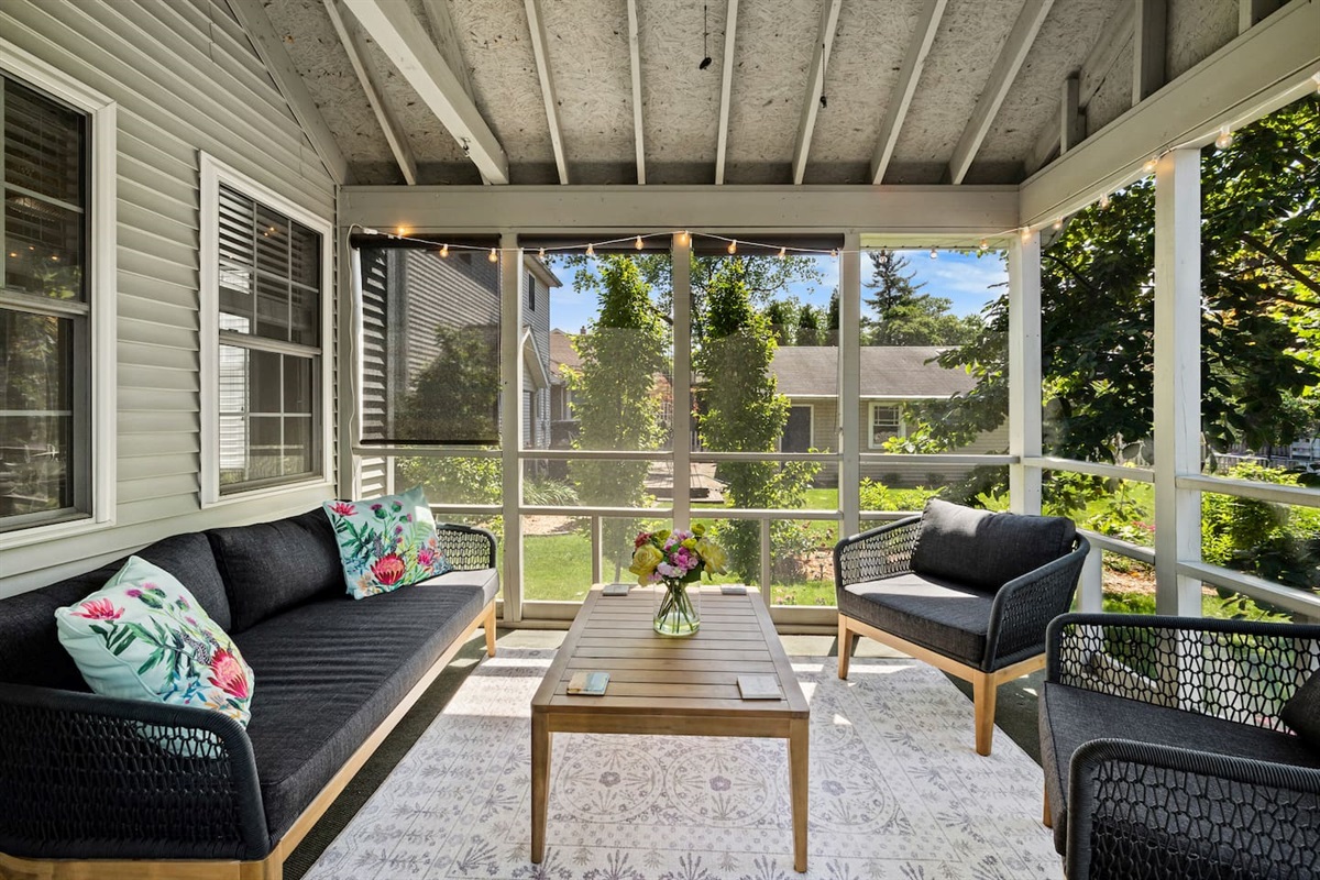 Screened-in porch located just off the dining room, is the perfect spot to enjoy your cup of coffee in the morning, or engage in fun conversations in the evening!