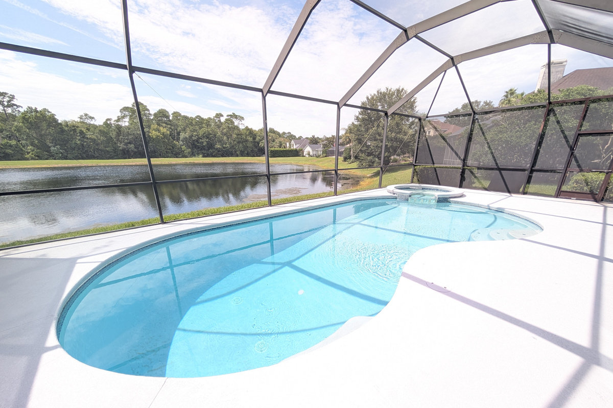 Relax by the private pool while taking in beautiful water views right from the backyard.