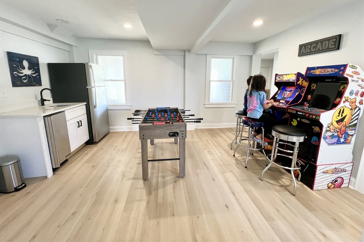 Play arcade games or foosball in the game area equipped with a fridge, ice maker, and 40" ROKU TV!