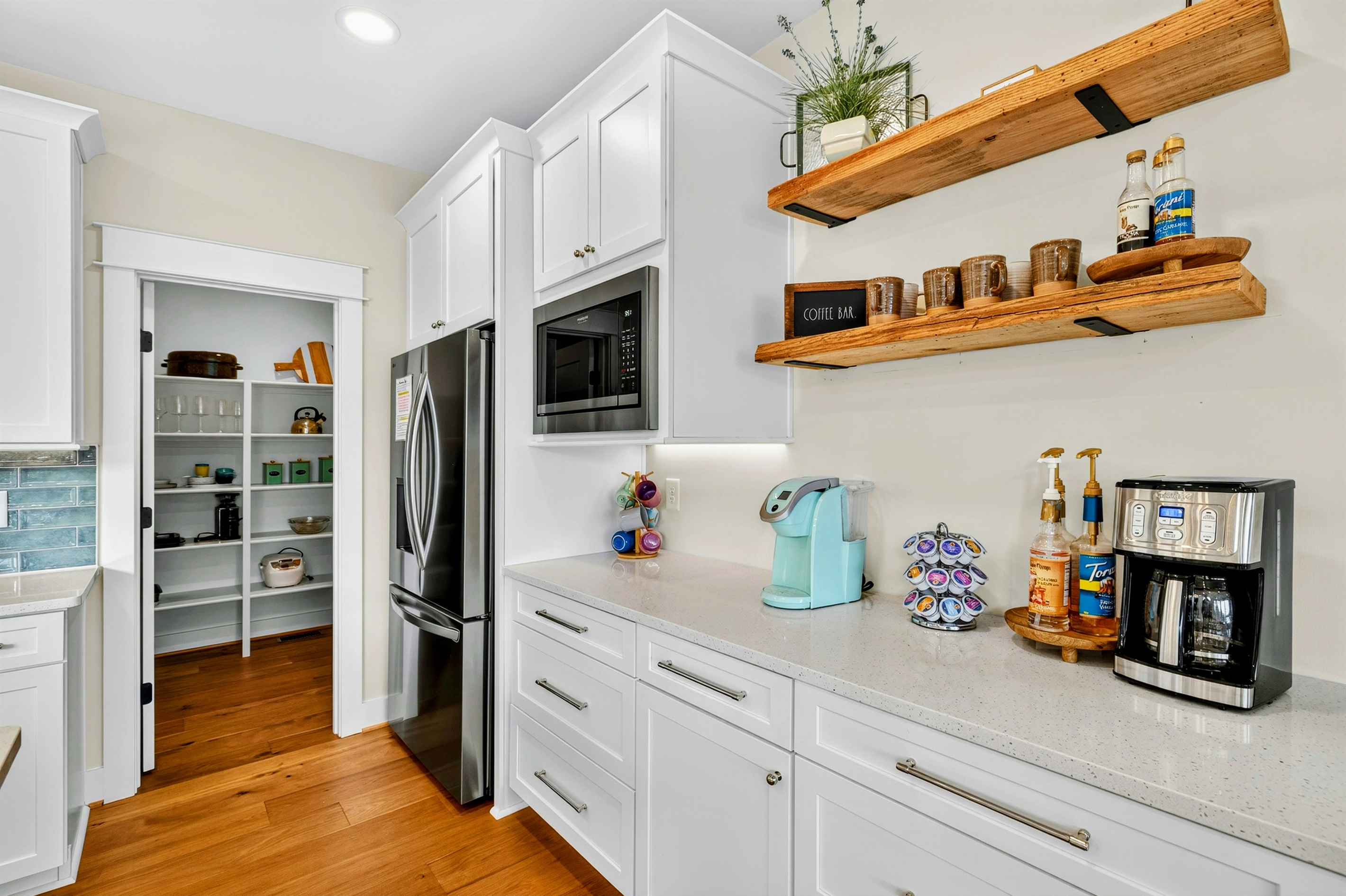 Coffee lovers will love our mini coffee bar in the kitchen. we offer a great selection of specialty coffee syrups as well as a Keurig, pods, coffee, grinder, and regular drip coffee maker.