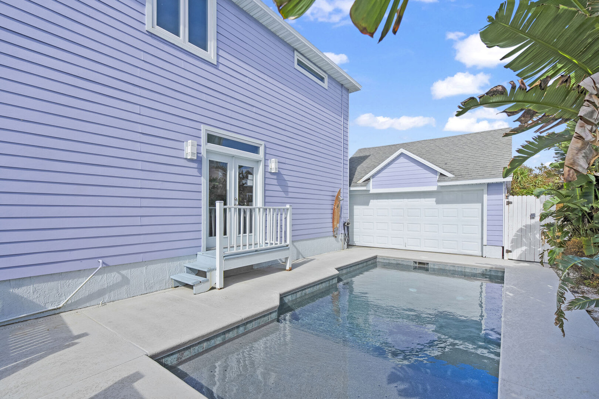 The pool and the house together, fenced and entirely your own. No sharing with a resort, no queueing for a lounger, and no walking anywhere at all to reach it. Just open the door and get straight into it.