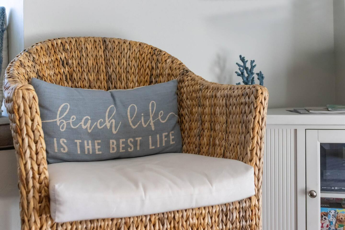 Find the little touches &mdash; the throw, the arrangement, the light &mdash; are what make this feel like a home rather than a rental. You'll notice them all week.