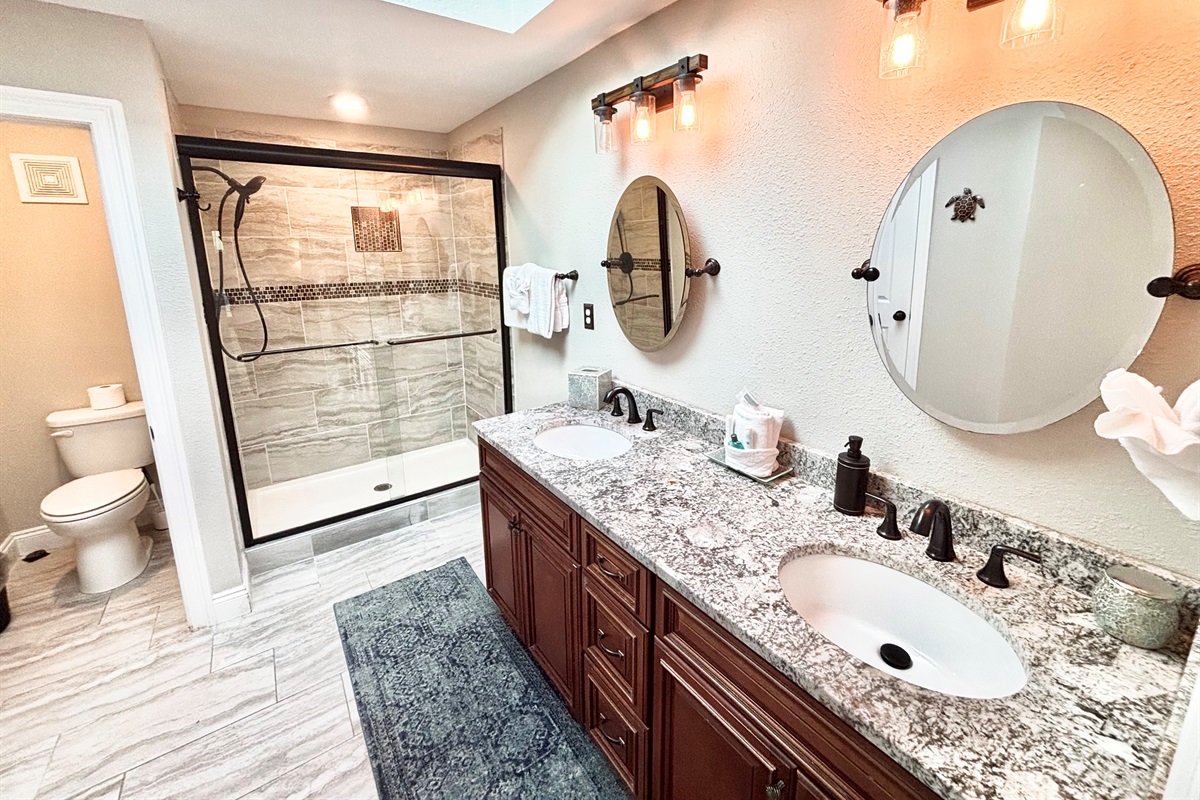 Large master bath with walk in shower and dual vanity