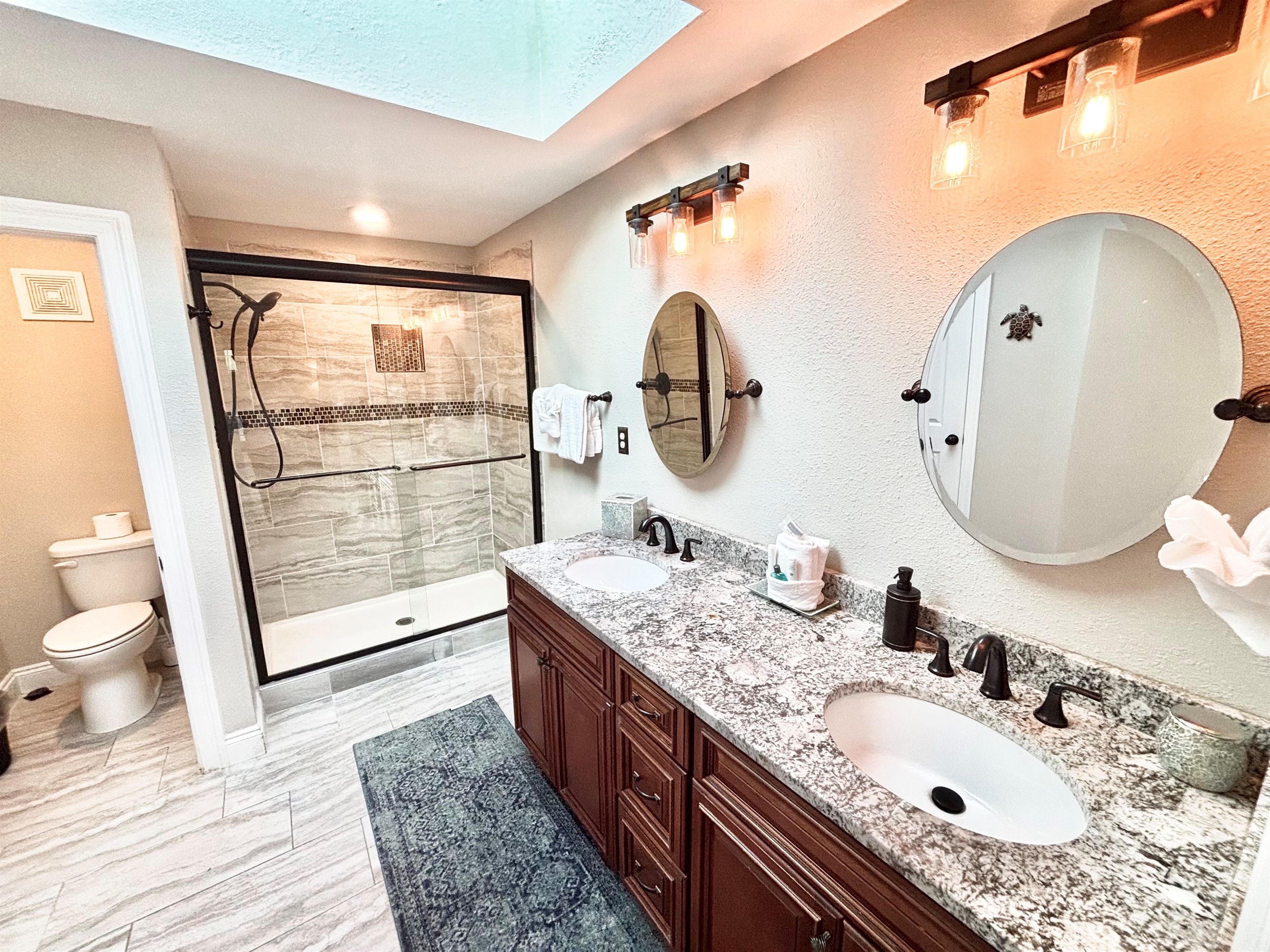 Large master bath with walk in shower and dual vanity
