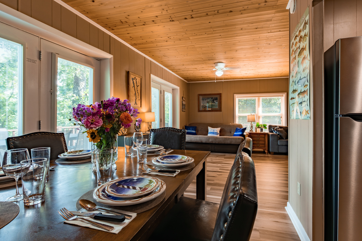 The open dining and living area keeps everyone connected, whether you’re sharing a meal, playing games, or unwinding.