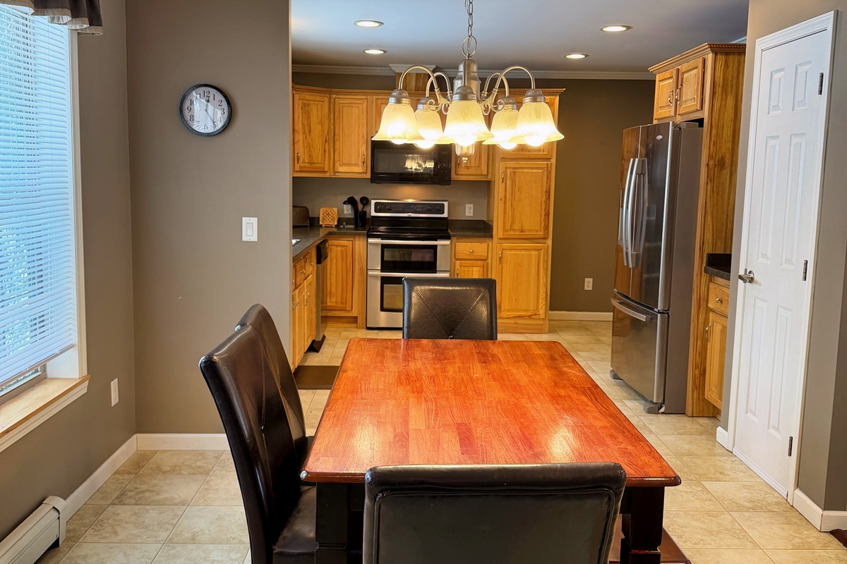 Dining room right next to the spacious kitchen.