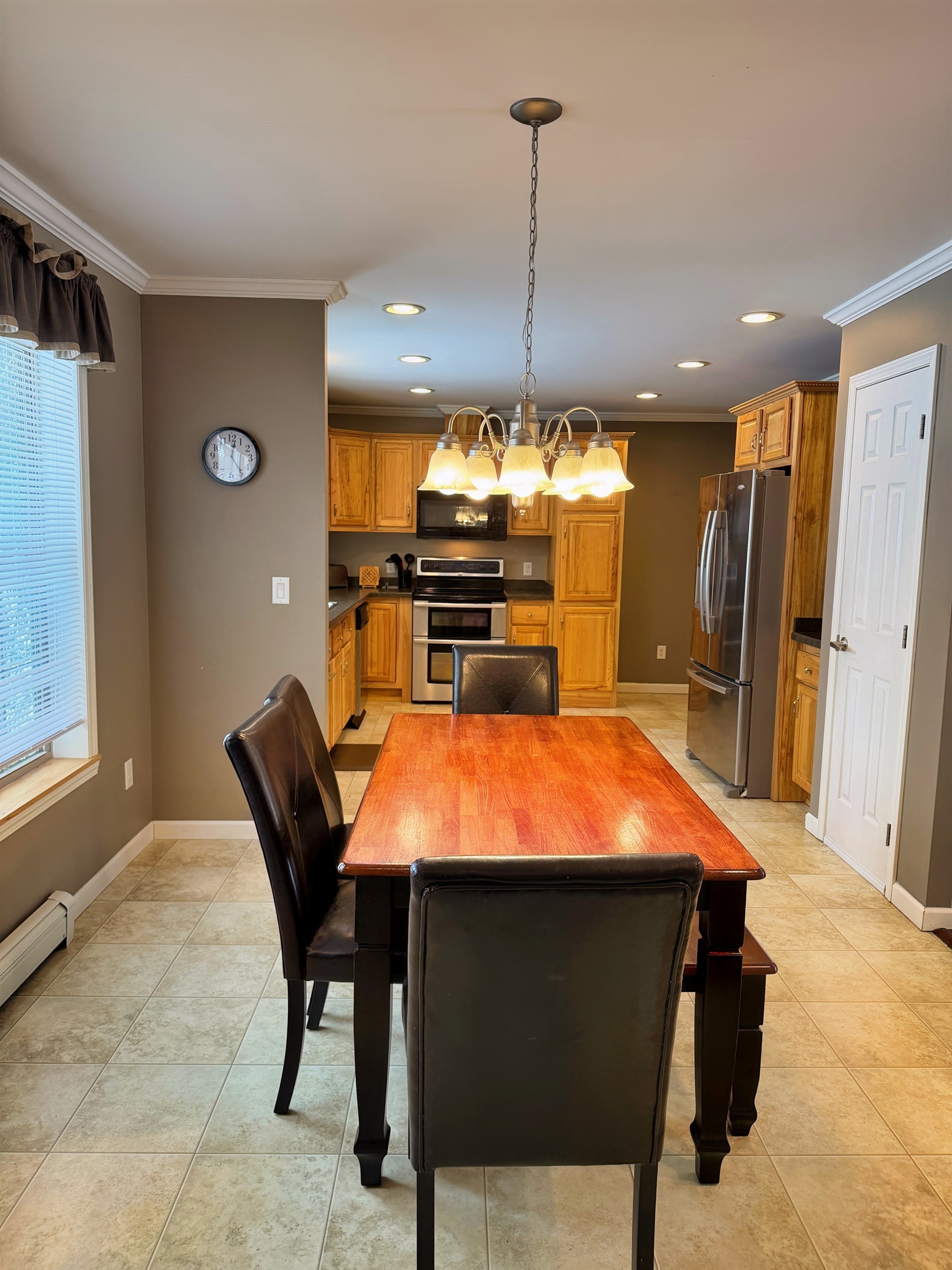 Dining room right next to the spacious kitchen.