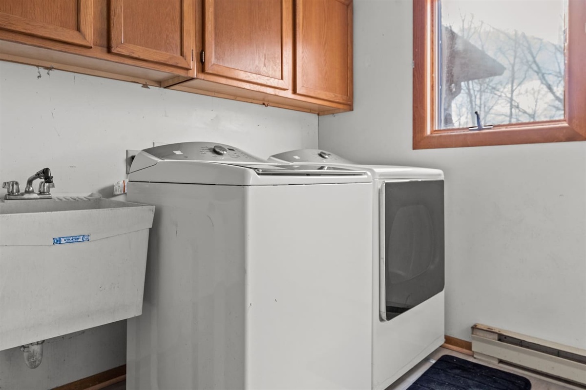 Laundry Room: Bright space with modern appliances—keep your wardrobe fresh during your stay!