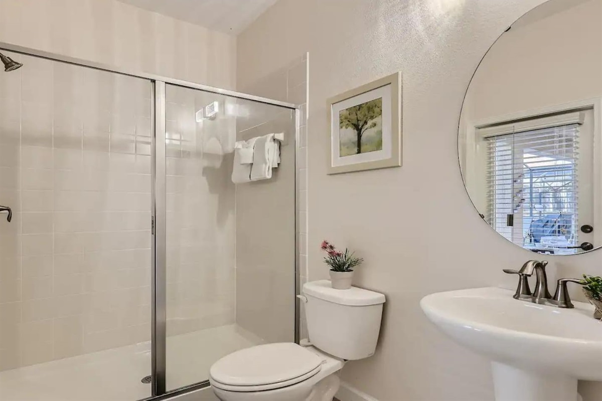 Bathroom with access to the pool and living room