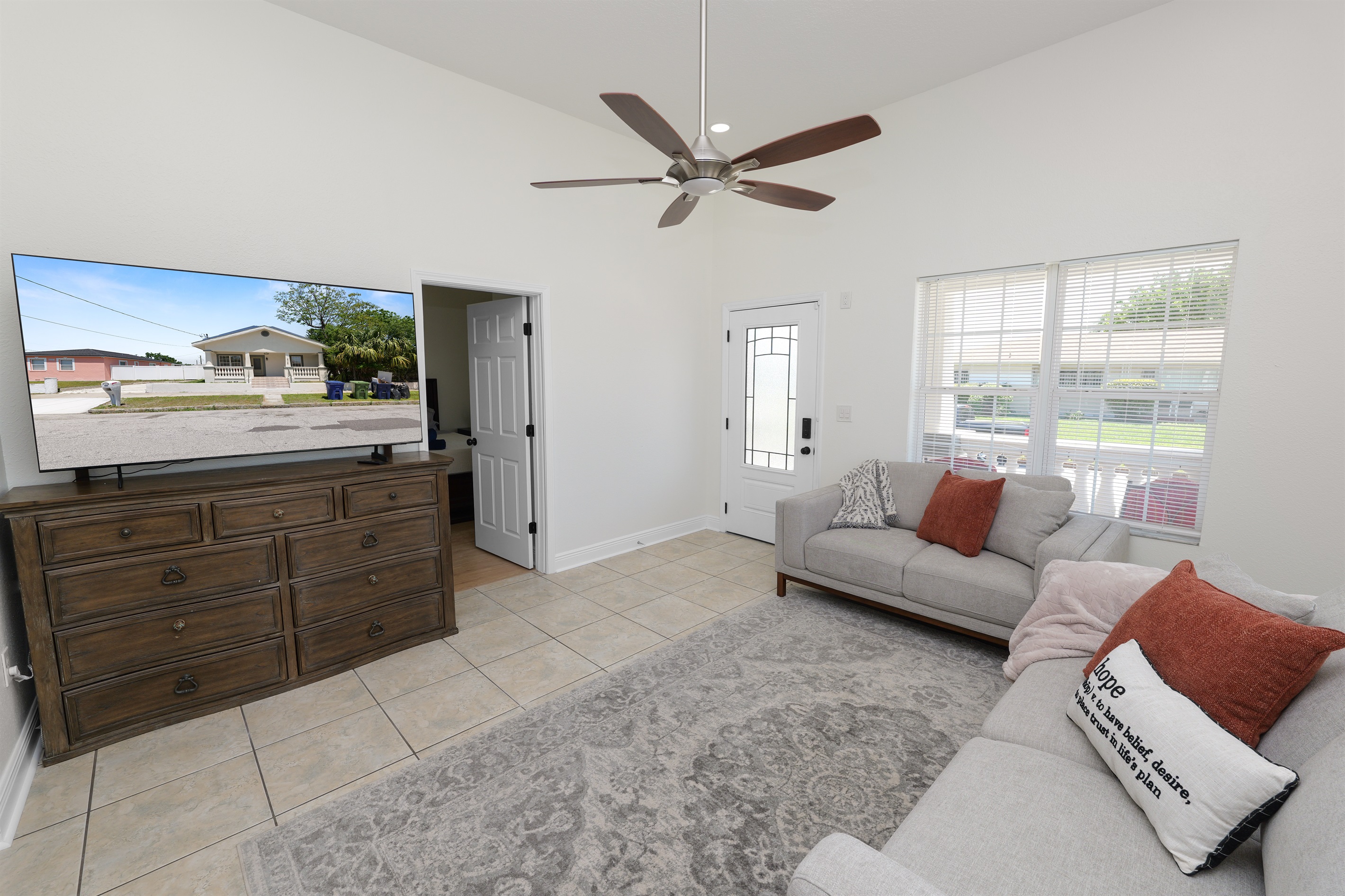 Modern neutral tones, warm tile flooring, and thoughtfully curated accents make this space as Instagram-worthy as it is inviting.
