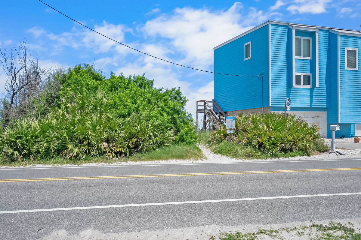 Coastal Highway with the beach access opposite. Cross carefully, and then the Atlantic is right there. Ten minutes south takes you to historic downtown St. Augustine whenever you fancy a change of scene.