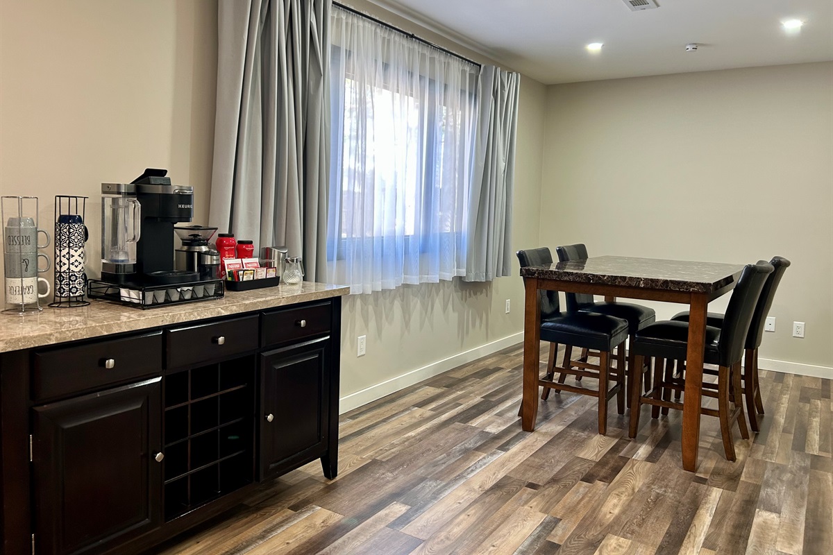 Beverage station and seating for 4 people.