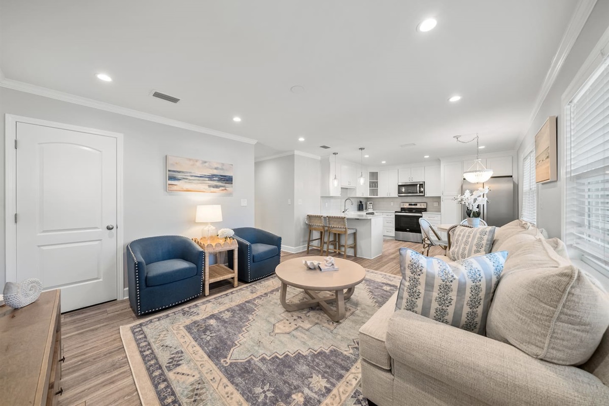 Living room of Unit B with a sleeper sofa. 